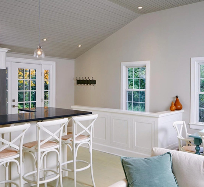 A living room with white walls and furniture.